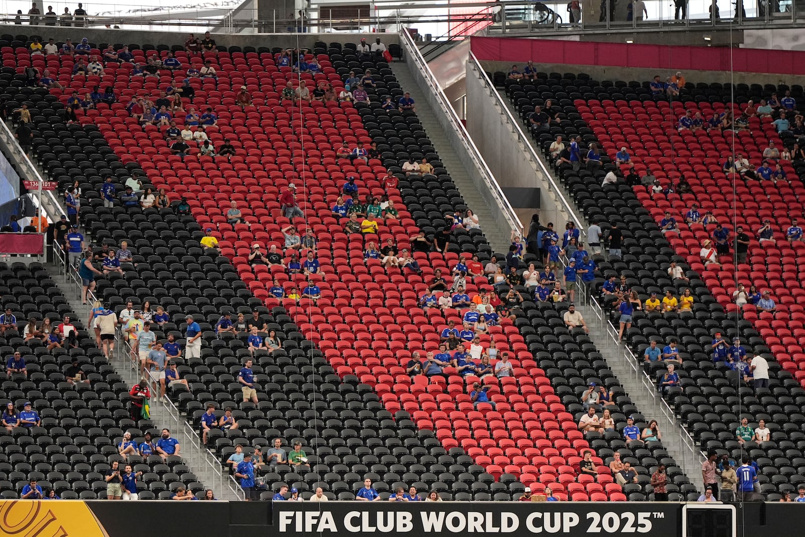 Fans wait for the start of the Club World Cup Group D soccer match between Chelsea and Los Angeles FC, Monday, June 16, 2025, in Atlanta. (AP Photo/Mike Stewart)