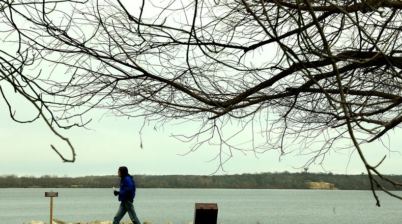 A man pictured walking at CJ Brown Reservoir in January 2022. A group of churches and ministries will be hold a free, family-friendly event called "Joy at the Rez" on Sunday, Aug. 24, at 2-5 p.m. at the reservoir to promote joy and unity within the local community. STAFF FILE