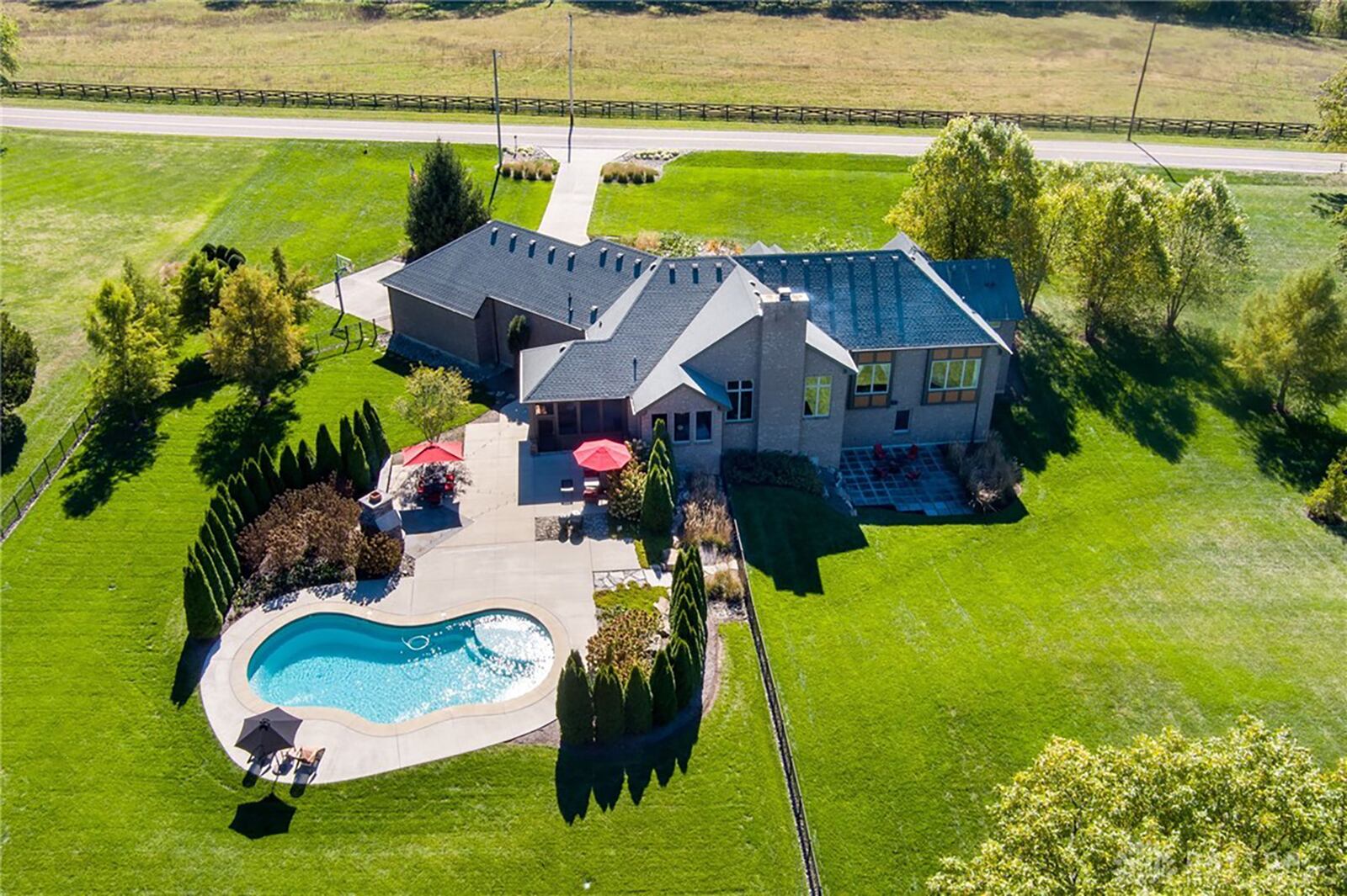 The three acre lot is fenced around the pool area and features professional landscaping. CONTRIBUTED