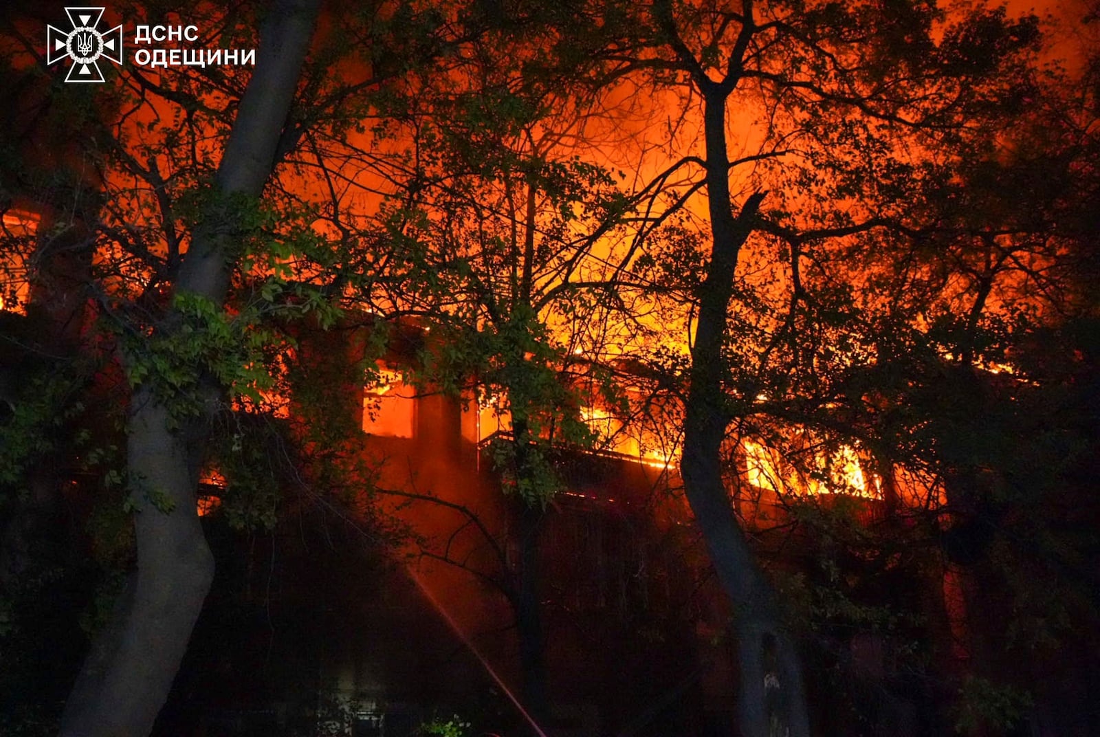 In this photo provided by the Ukrainian Emergency Service, firefighters put out the fire at an apartment house following Russia's air raid in Odesa, Ukraine, Thursday, May 1, 2025. (Ukrainian Emergency Service via AP)