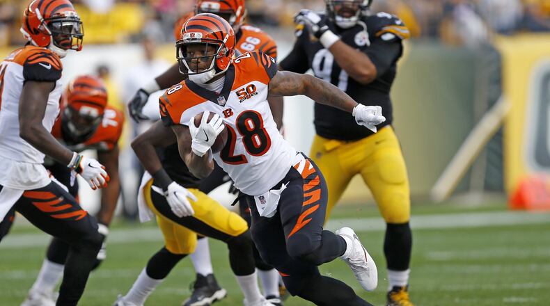 Cincinnati Bengals running back Joe Mixon (28) carries the ball during the first half of an NFL football game against the Pittsburgh Steelers in Pittsburgh, Sunday, Oct. 22, 2017. The Steelers won 29-14. (AP Photo/Keith Srakocic)