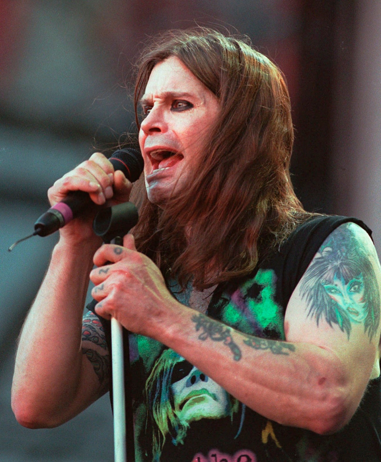 FILE - Ozzy Osbourne performs with Black Sabbath during the Ozzfest concert on June 15, 1997, in East Rutherford, N.J. (AP Photo/Bill Kostroun, file)