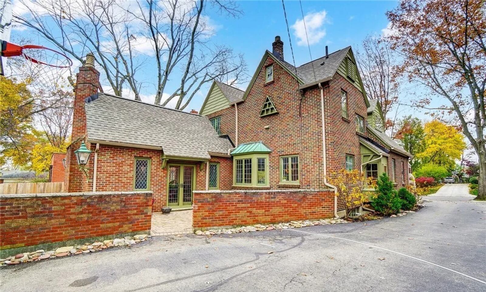 Listed for $575,000 by Sibcy Cline Realtors, this two-story home at 153 Spirea Drive in Oakwood has about 2,663 feet of living space plus a full basement finished to match the Tudor style. CONTRIBUTED