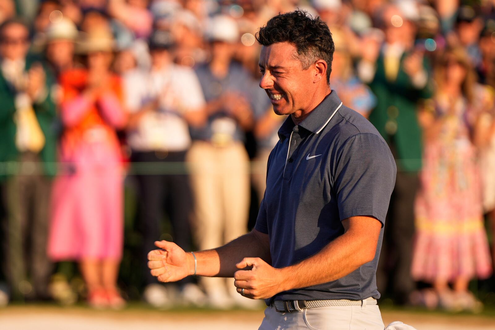 Rory McIlroy, of Northern Ireland, celebrates winning in a playoff against Justin Rose, of England, after the final round the Masters golf tournament, Sunday, April 13, 2025, in Augusta, Ga. (AP Photo/Julia Demaree Nikhinson)