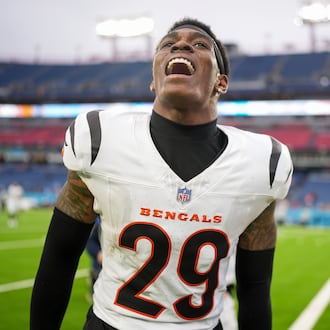 Cincinnati Bengals cornerback Cam Taylor-Britt (29) celebrates after an NFL football game against the Tennessee Titans, Sunday, Dec. 15, 2024, in Nashville, Tenn. The Bengals won 37-27. (AP Photo/George Walker IV)