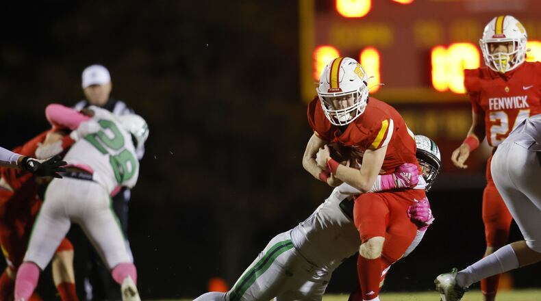 Fenwick's Connor Schmueling carries the ball during their game against Badin. Badin defeated Fenwick 14-6 in their football game Friday, Oct. 14, 2022 at Bishop Fenwick High School. NICK GRAHAM/STAFF