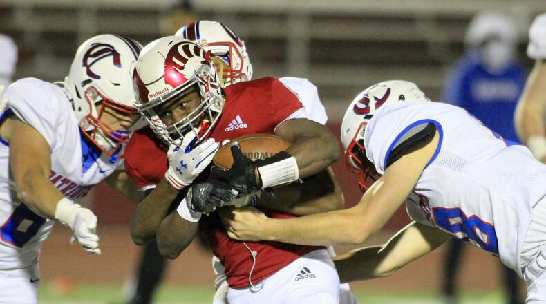 Trotwood-Madison's Hezekiah Hudson-Davis run against Carroll on Friday, Oct. 16, 2020, in Trotwood. David Jablonski/Staff
