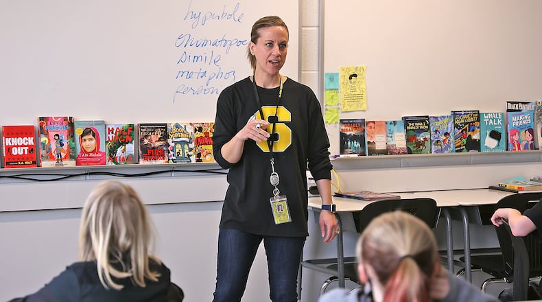 Darcy Leis, seventh-grade English teacher at Clark-Shawnee, is one of four teachers receiving the Excellence in Teaching award. BILL LACKEY/STAFF