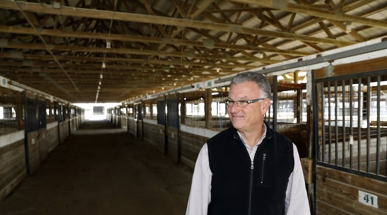 Dean Blair, director of the Clark County Fair, looks over the inside of one of the horse barns at the Clark County Fairgrounds in November of 2016. Bill Lackey/Staff