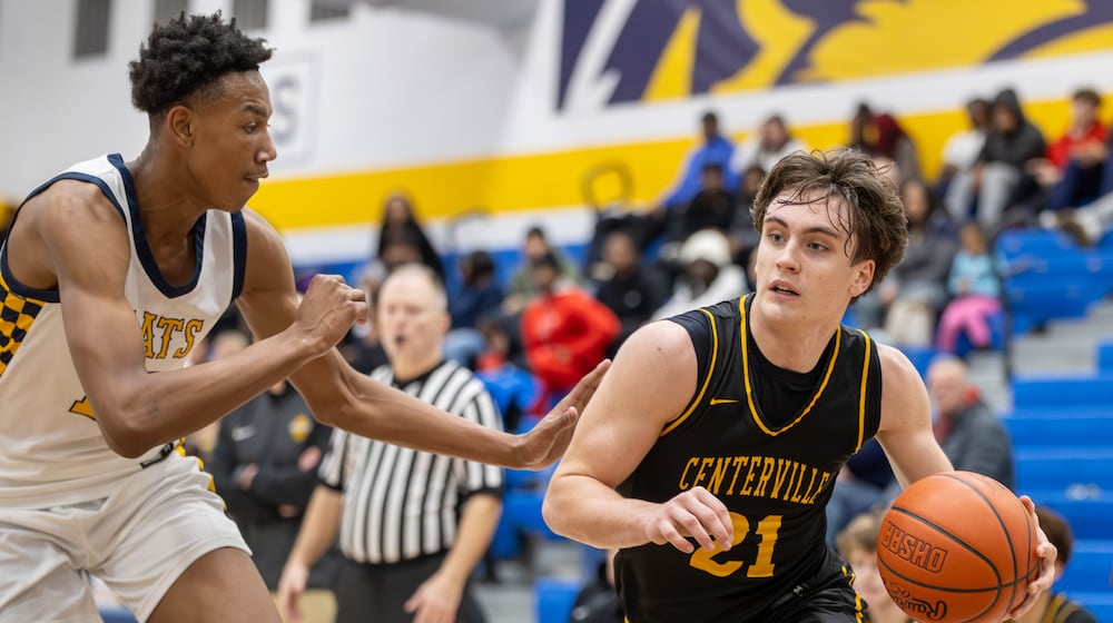 The Centerville High School boys basketball team beat Springfield 56-44 on Tuesday, Feb. 3, 2026 to win their eighth straight Greater Western Ohio Conference championship. MICHAEL COOPER / STAFF