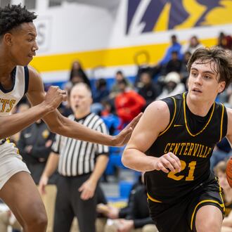 The Centerville High School boys basketball team beat Springfield 56-44 on Tuesday, Feb. 3, 2026 to win their eighth straight Greater Western Ohio Conference championship. MICHAEL COOPER / STAFF