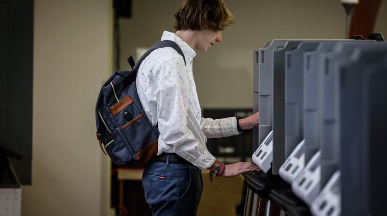 Kyle Bucklew votes early at Montgomery County Board of Elections Thursday March 14, 2024. JIM NOELKER/STAFF