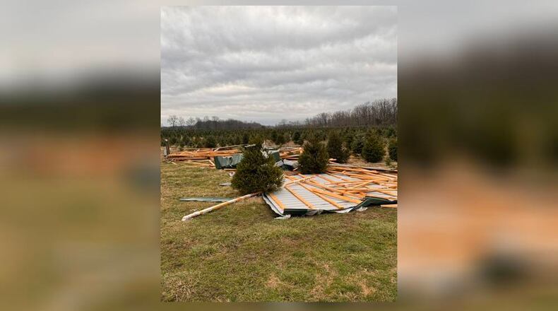 One of the two barns at the Young’s Jersey Dairy Christmas Tree Farm was damaged in the severe thunderstorms Wednesday morning. Contributed