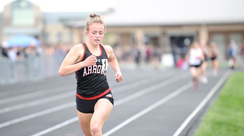 Tecumseh junior Kylee Mastin approaches the finish line in the 1,600-meter run with the field behind her at the Central Buckeye Conference championships Tuesday at Northwestern High School. Greg Billing / Contributed