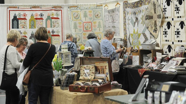 Joining or starting a social club such as quilting is a good way for individuals over 50 to make friends and avoid isolation.  MARSHALL GORBY\STAFF