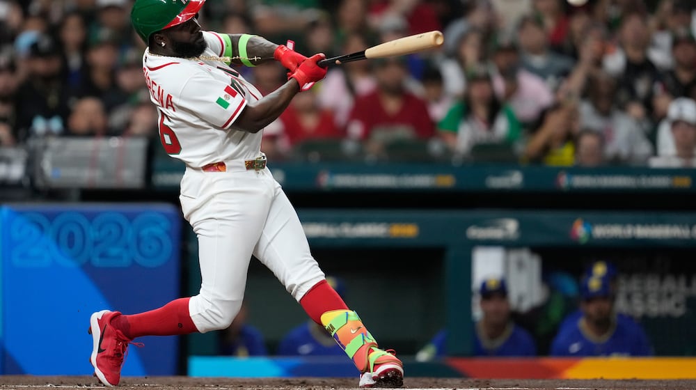 Mexico's Randy Arozarena doubles during the first inning of a World Baseball Classic game against Brazil, Sunday, March 8, 2026, in Houston. (AP Photo/Ashley Landis)