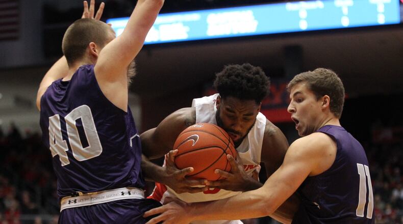 Dayton's Josh Cunningham looks for a shot against Capital on Friday, Nov. 2, 2018, at UD Arena.