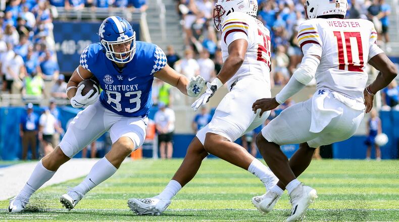 Kentucky tight end Justin Rigg (83) tries to run the ball past Louisiana-Monroe defenders during the second half of an NCAA college football game in Lexington, Ky., Saturday, Sept. 4, 2021. (AP Photo/Michael Clubb)