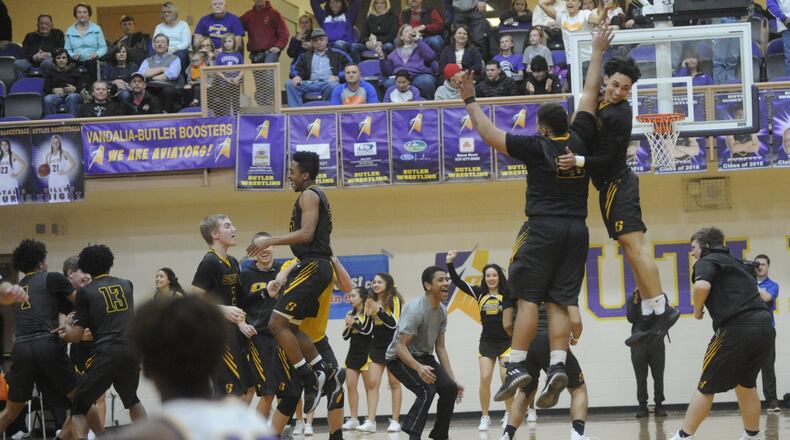 Butler’s Bryant Johnson (12) watches as Sidney celebrates. Sidney defeated host Butler 36-34 in a boys high school basketball game on Tue., Feb. 13, 2018. MARC PENDLETON / STAFF