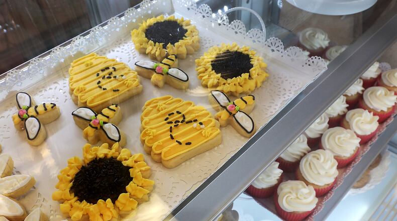 Some of the cookies and cupcakes at D’s Sweets. BILL LACKEY/STAFF