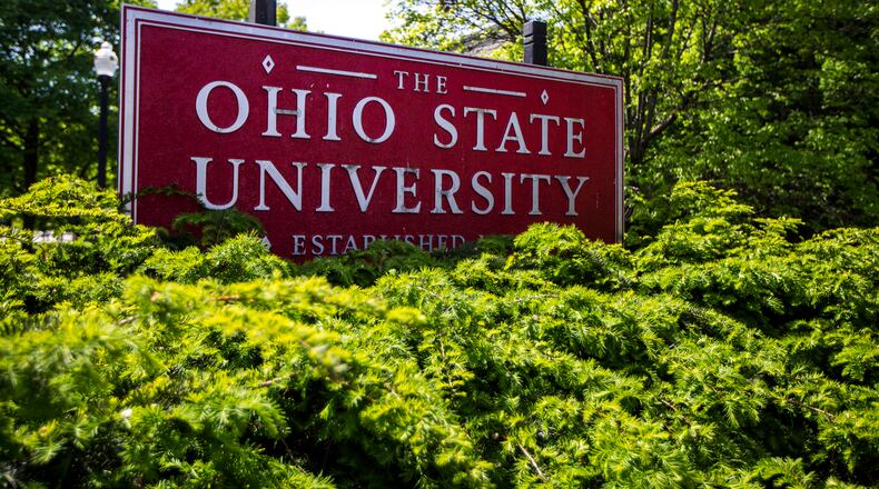 FILE - This May 8, 2019, photo, shows a sign for The Ohio State University in Columbus, Ohio. Ohio State University has won its fight to trademark the word "The." The U.S. Patent and Trademark Office approved the university's request Tuesday, June 21, 2022. The school says it allows Ohio State to control use of "The" on branded products associated with and sold through athletics and collegiate channels. (AP Photo/Angie Wang, File)