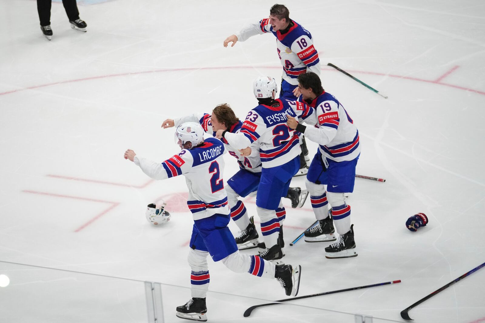 Team USA celebrates after winning the final match between United States and Switzerland at the ice hockey world championships in Stockholm, Sweden, Sunday, May 25, 2025. (AP Photo/Petr David Josek)