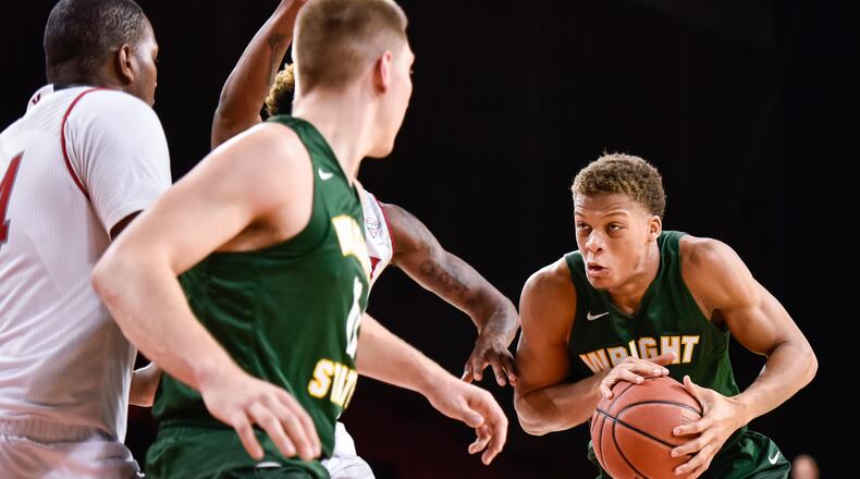 Wright State’s Everett Winchesterdrives to the hoop during their game Tuesday, Nov. 14 at Millett Hall on the Miami University Campus in Oxford. The Miami University Redhawks basketball team defeated the Wright State Raiders 73-67 in overtime. NICK GRAHAM/STAFF