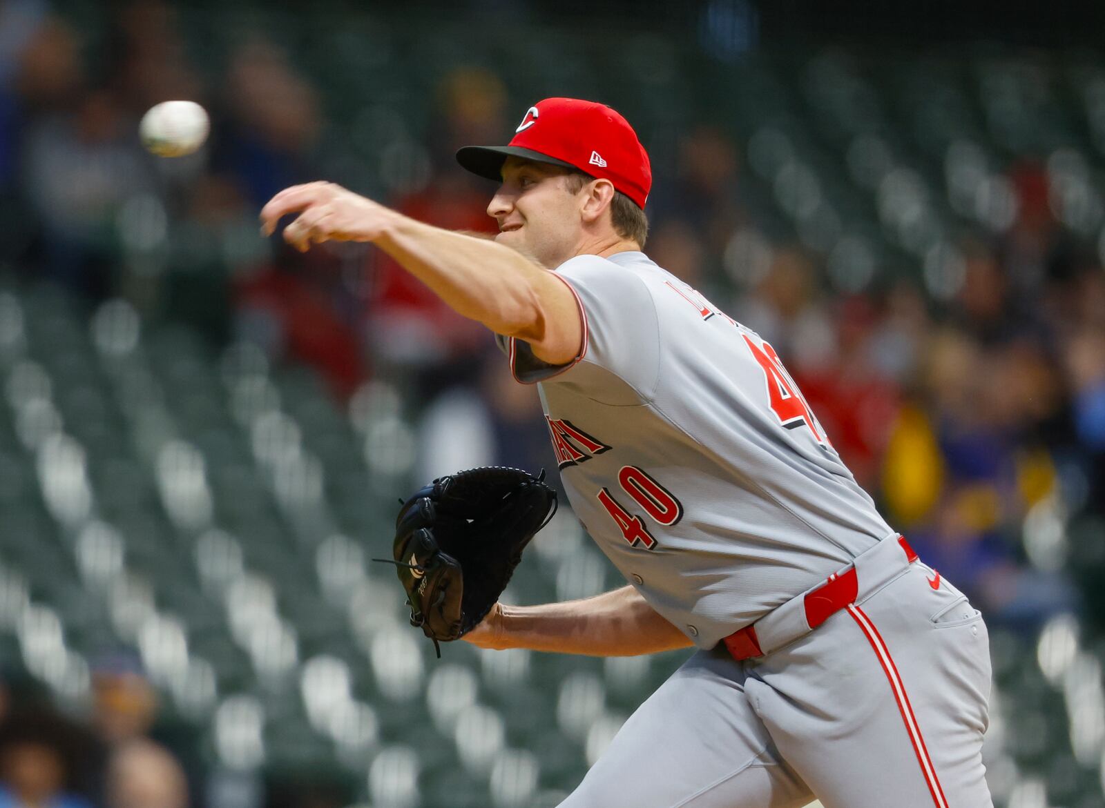 Cincinnati Reds starting pitcher Nick Lodolo throws to the Milwaukee Brewers during the first inning of a baseball game, Thursday, April 3, 2025, in Milwaukee. (AP Photo/Jeffrey Phelps)