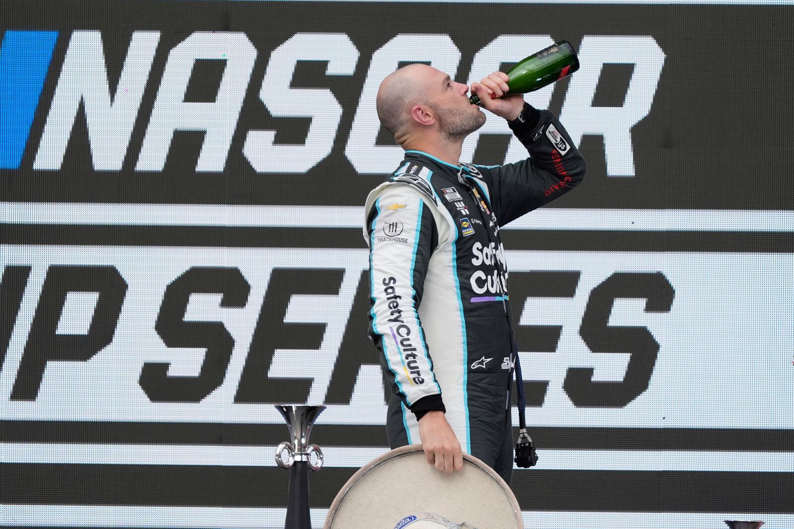 Shane Van Gisbergen celebrates after winning a NASCAR Cup Series auto race at Hermanos Rodríguez race track in Mexico City, Sunday, June 15, 2025. (AP Photo/Fernando Llano)