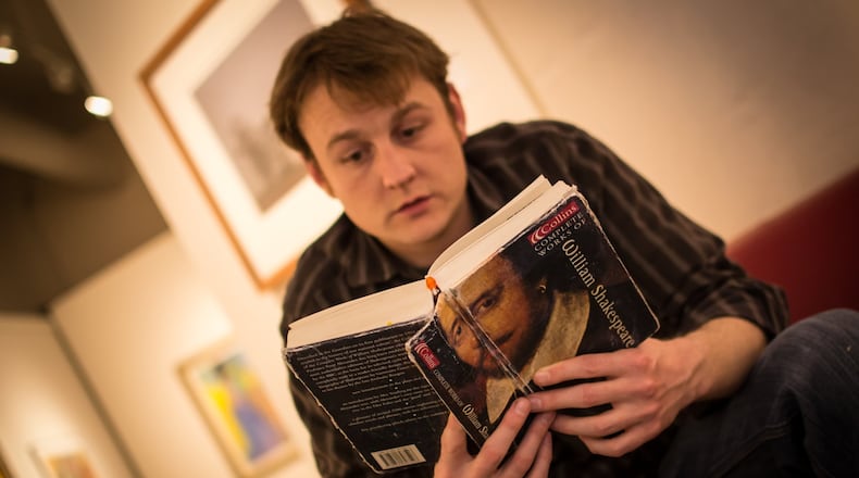 Chris Shea of “Free Shakespeare” is pictured with his treasured copy of “The Complete Works of William Shakespeare.” Photo by Jennifer Taylor Clarke