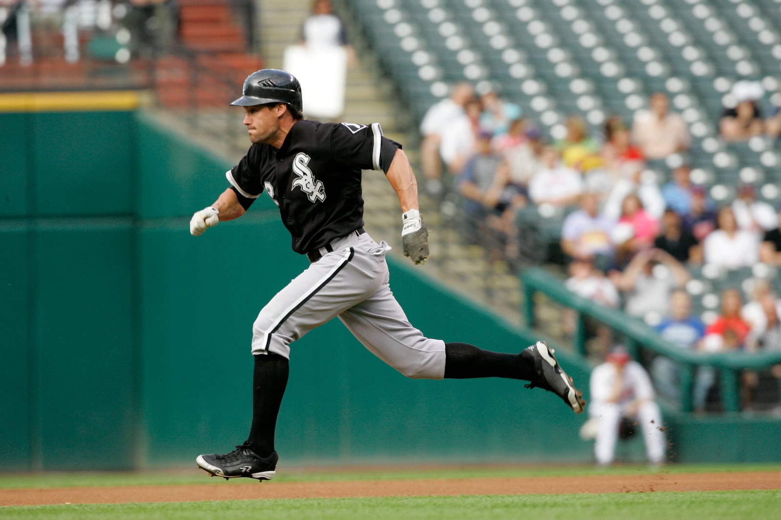 FILE - Chicago White Sox's Scott Podsednik steals second base during a baseball game against the Cleveland Indians, June 29, 2009, in Cleveland. (AP Photo/Mark Duncan, File)