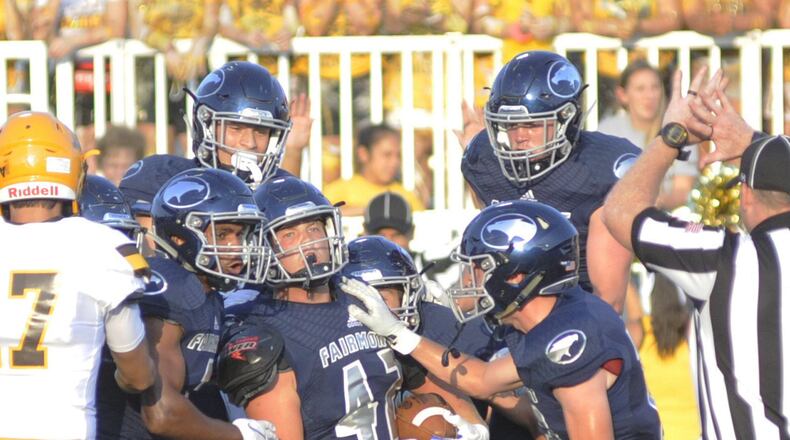 Senior linebacker Trey Baker (with ball) of Fairmont is the Division I defensive player of the year. MARC PENDLETON / STAFF