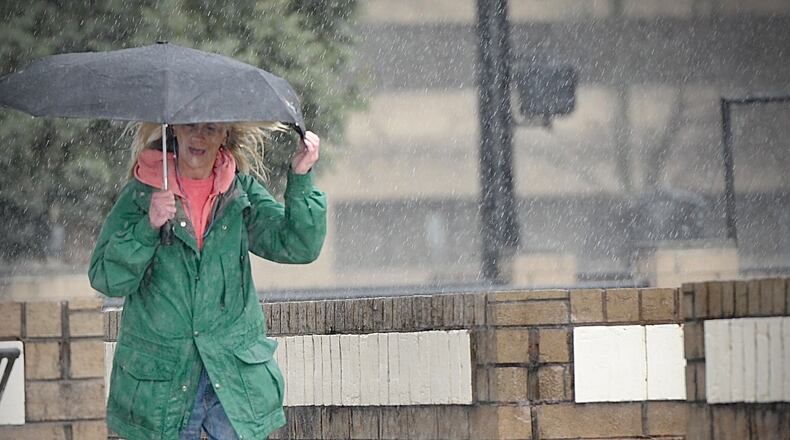 Heavy rainfall and strong winds in Xenia as tornado sirens go off Monday, February 27, 2023. MARSHALL GORBY\STAFF