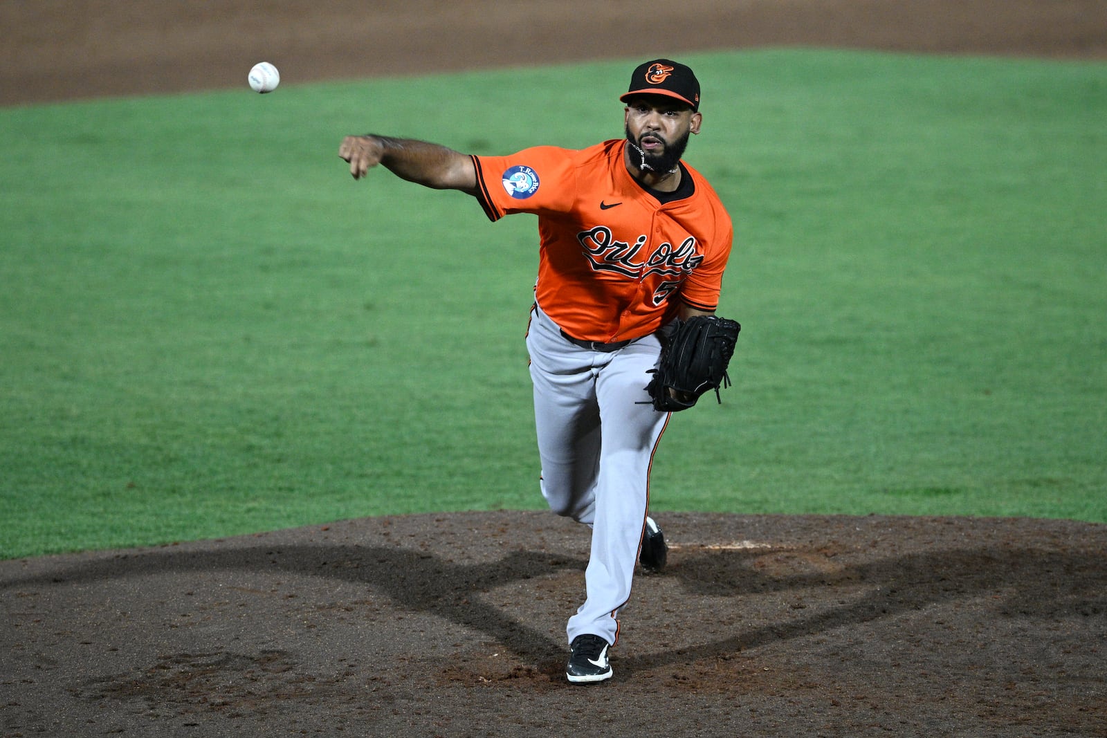 Baltimore Orioles pitcher Seranthony Domínguez throws to home plate during the eighth inning of a baseball game against the Tampa Bay Rays, Saturday, July 19, 2025, in Tampa, Fla. (AP Photo/Phelan M. Ebenhack)