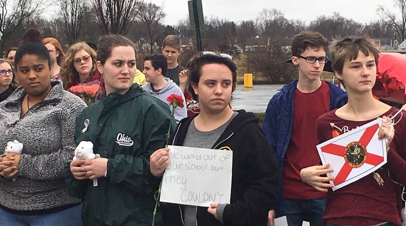 Students at the Dayton Regional STEM School walked out of school Wednesday, Feb. 21, 2018, in memory of the 17 individuals who died during the mass shooting at Marjory Stoneman Douglas High School in Parkland, Fla. WILL GARBE / STAFF