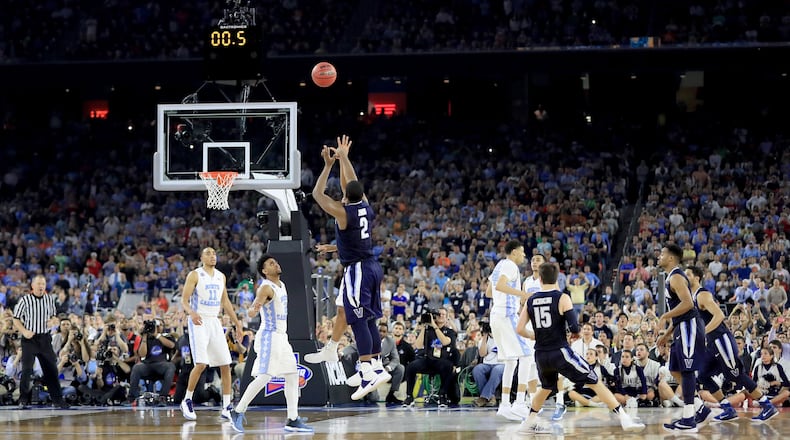 HOUSTON, TEXAS - APRIL 04:  Kris Jenkins #2 of the Villanova Wildcats shoots the game-winning three pointer to defeat the North Carolina Tar Heels 77-74 in the 2016 NCAA Men's Final Four National Championship game at NRG Stadium on April 4, 2016 in Houston, Texas.  (Photo by Ronald Martinez/Getty Images)