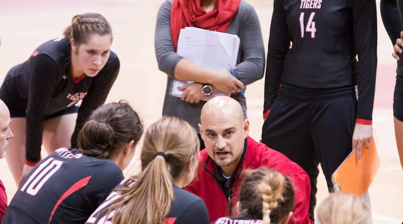 Wittenberg volleyball coach Paco Labrador talks to his team during a match at Pam Evans Smith Arena. Contributed photo by Erin Pence