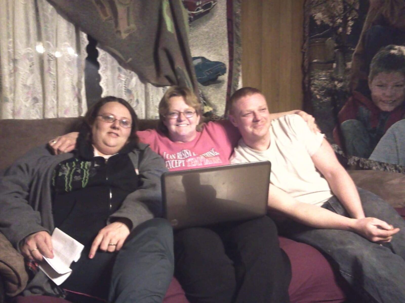 Alicia Paulus is on the left. Her brother is on the right and mom in the middle. 