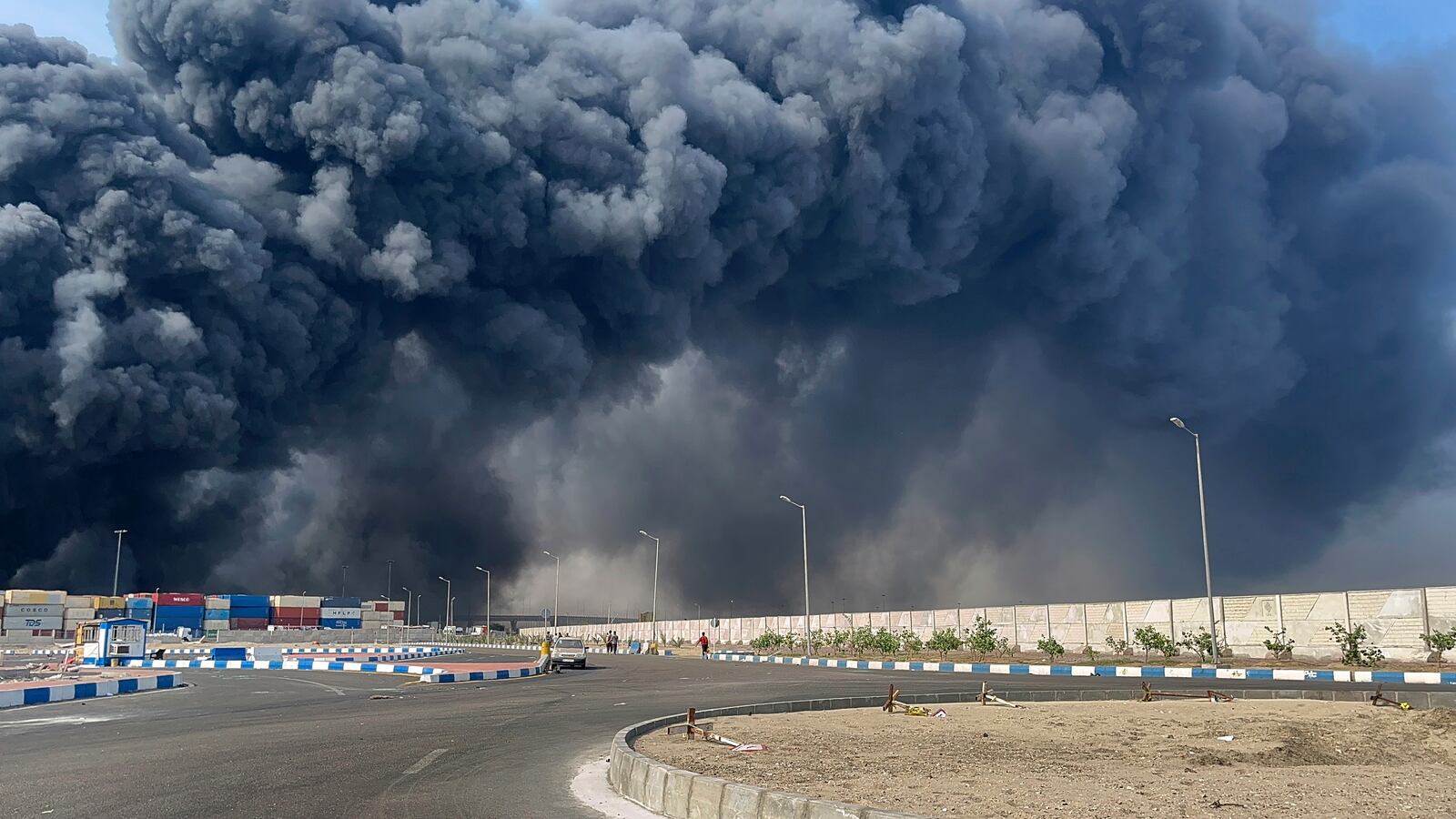 In this photo provided by Iranian Students' News Agency, ISNA, a black smoke rises in the sky after a massive explosion rocked a port near the southern port city of Bandar Abbas, Iran, Saturday, April 26, 2025. (Razieh Pudat/ISNA via AP)