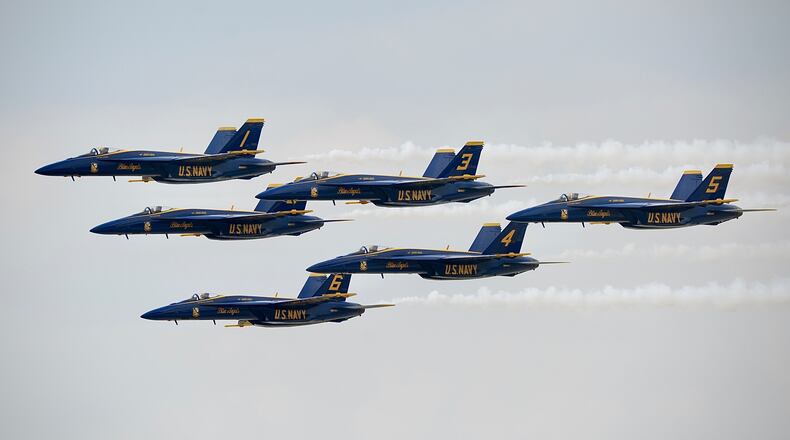 The U.S. Navy Blue Angels fly in formation as they arrive in Dayton Wednesday, June 19, 2024, ahead of the CenterPoint Energy Dayton Air Show this weekend at the Dayton International Airport. MARSHALL GORBY\STAFF