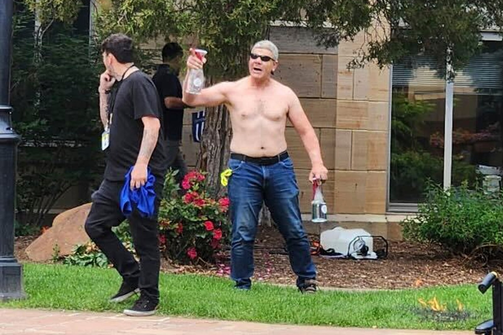 In this June 1, 2025 photo provided by Lisa Turnquist, Boulder, Colorado attack suspect Mohamed Sabry Soliman is seen as he launched a fiery attack on demonstrators at an outdoor mall, Sunday, June 1, 2025, in Boulder, Colo. (Lisa Turnquist via AP)