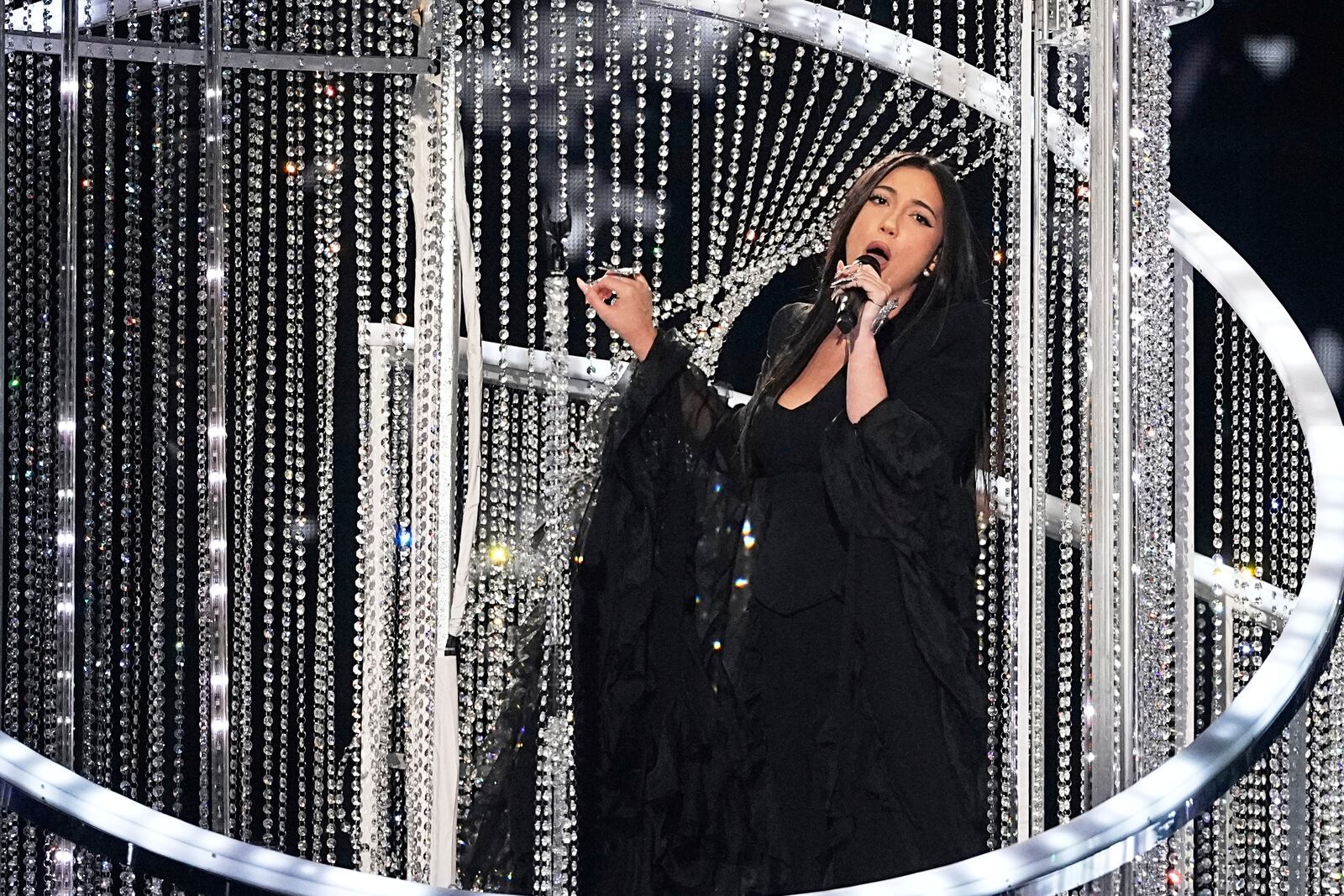 Yuval Raphael from Israel performs the song "New Day Will Rise" during the Grand Final of the 69th Eurovision Song Contest, in Basel, Switzerland, Saturday, May 17, 2025. (AP Photo/Martin Meissner)