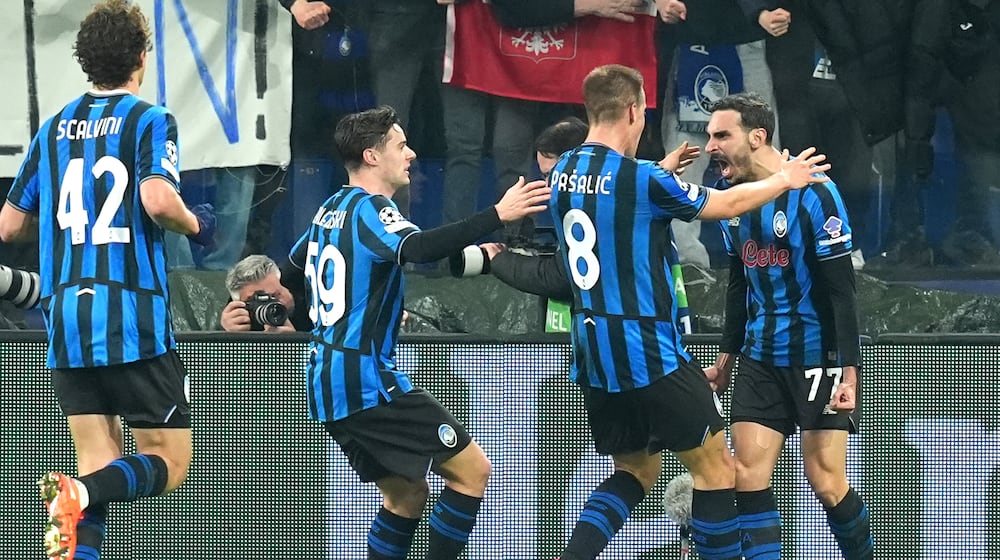 Atalanta's Davide Zappacosta (77) celebrates after scoring their second goal during the Champions League second leg playoff match between Atalanta and Borussia Dortmund in Bergamo, Italy, Wednesday, Feb. 25, 2026. (Spada/LaPresse via AP)