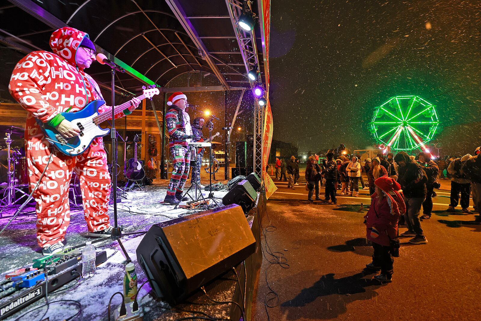 The Temps play in the snow for the Holiday in the City crowd Friday, Nov. 29, 2024. BILL LACKEY/STAFF