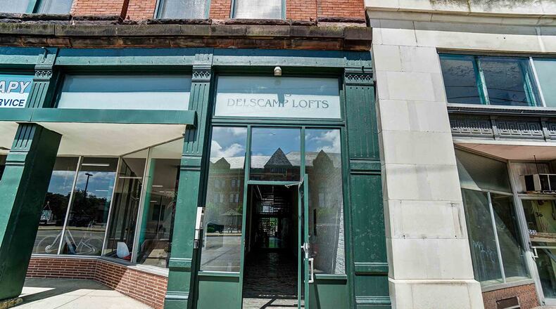 Offering approximately 2,210 sq. ft. of living space, this 2-bedroom loft condo is in the historic Delscamp Loft building, which dates back to 1893. Its open design includes the kitchen, dining room and living room. CONTRIBUTED PHOTO