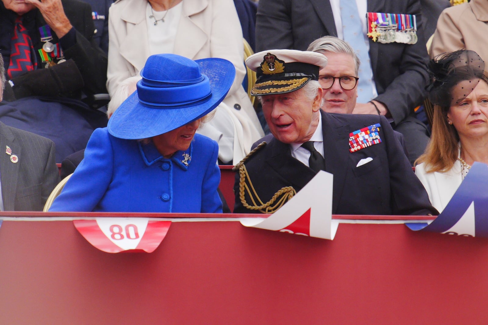 Britain's King Charles III and Queen Camilla during the military procession marking the 80th anniversary of VE Day, in London, Monday, May 5, 2025. (Ben Birchall/Pool Photo via AP)