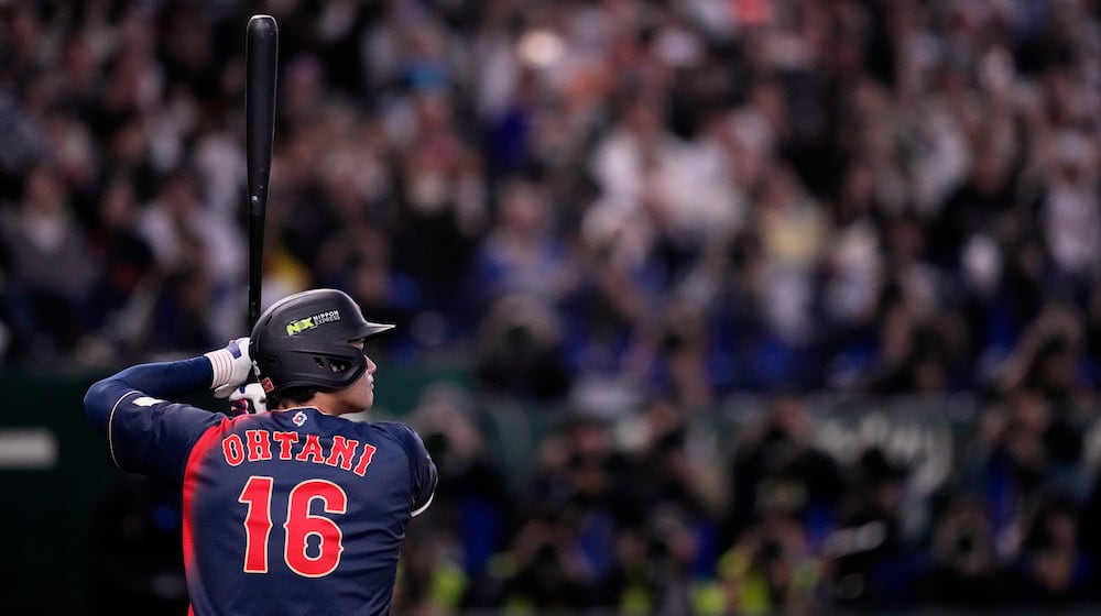 Japan's Shohei Ohtani bats during the second inning of a World Baseball Classic Pool C game between Japan and Taiwan Friday, March 6, 2026 in Tokyo. (AP Photo/Louise Delmotte)