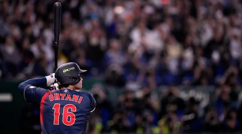 Japan's Shohei Ohtani bats during the second inning of a World Baseball Classic Pool C game between Japan and Taiwan Friday, March 6, 2026 in Tokyo. (AP Photo/Louise Delmotte)