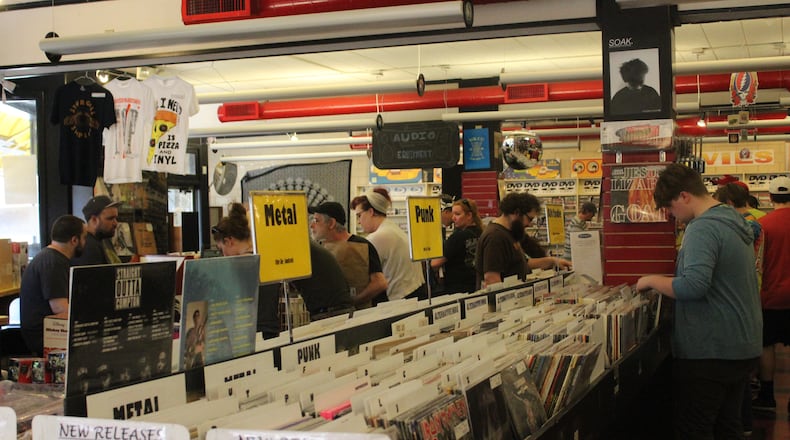 Omega Music in downtown Dayton is among local record stores prepared to celebrate National Record Day on Saturday, April 22. FILE