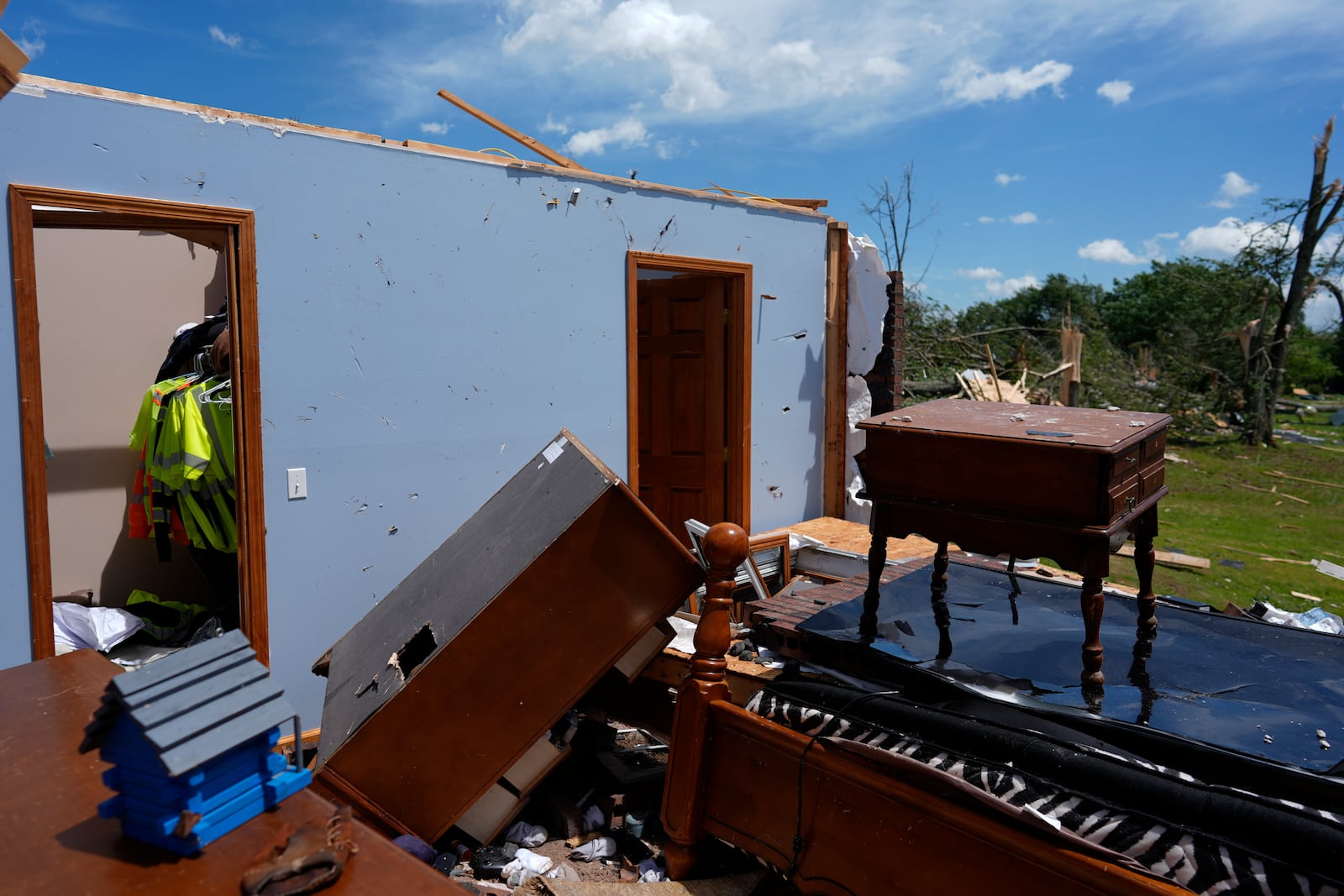 A home is destroyed after a severe storm passed the area on Saturday, May 17, 2025 in London, Ky. (AP Photo/Carolyn Kaster)